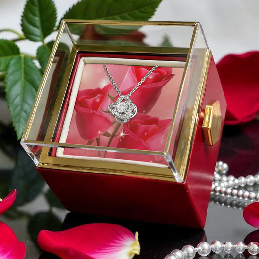 Liebesknoten mit rotierender Rosengeschenkbox