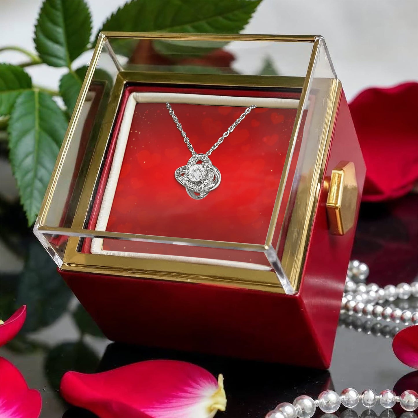 Liebesknoten mit rotierender Rosen-Geschenkbox
